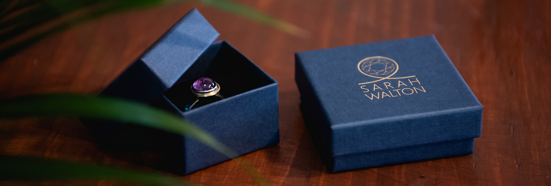 Jewellery rings presented in navy boxes